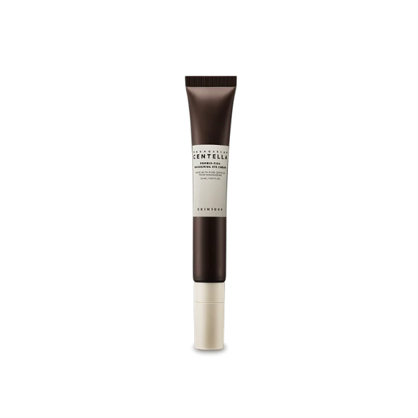 Madagascar Centella Probio-cica Bakuchiol Eye Cream – Vue produit du tube d’un contour des yeux Skin1004, au design sobre et élégant, dans des tons brun foncé et crème.
